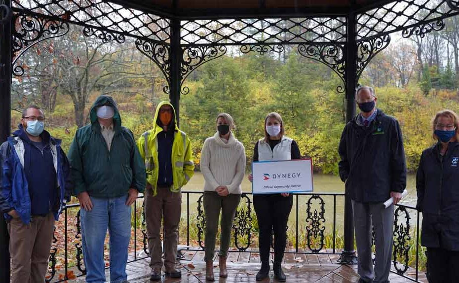 Members of Dynegy and Cincinnati Parks accept the grant to purchase 50 trees for Mt. Airy Forest Arboretum