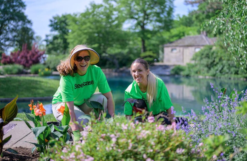 Steelcase volunteers at Eden Park planting flowers