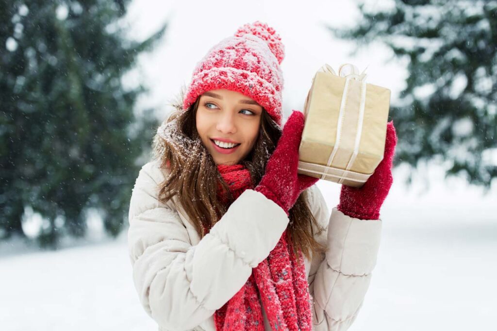 Woman holding a gift in Cincinnati Parks