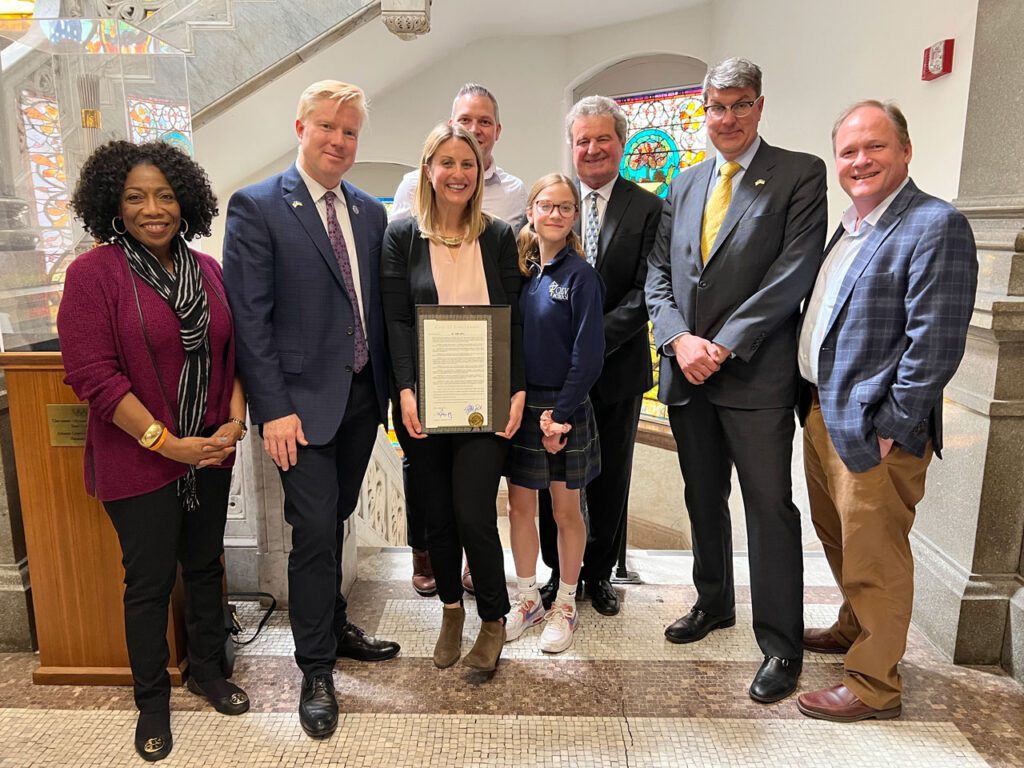 Jennifer with City Council and Park Board members in City Hall