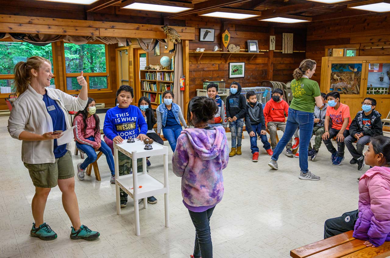 Cincinnati Parks' Explore Nature naturalist with children at a nature center